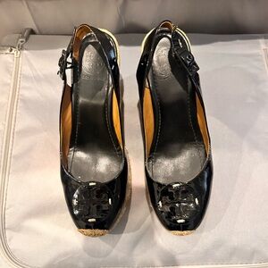 Black patent leather Tory Burch sandals.